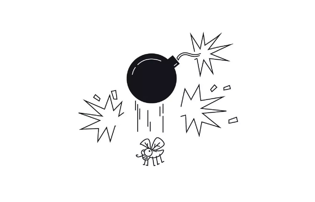 The image depicts an animated scene with a black bomb exploding over a cartoon character.